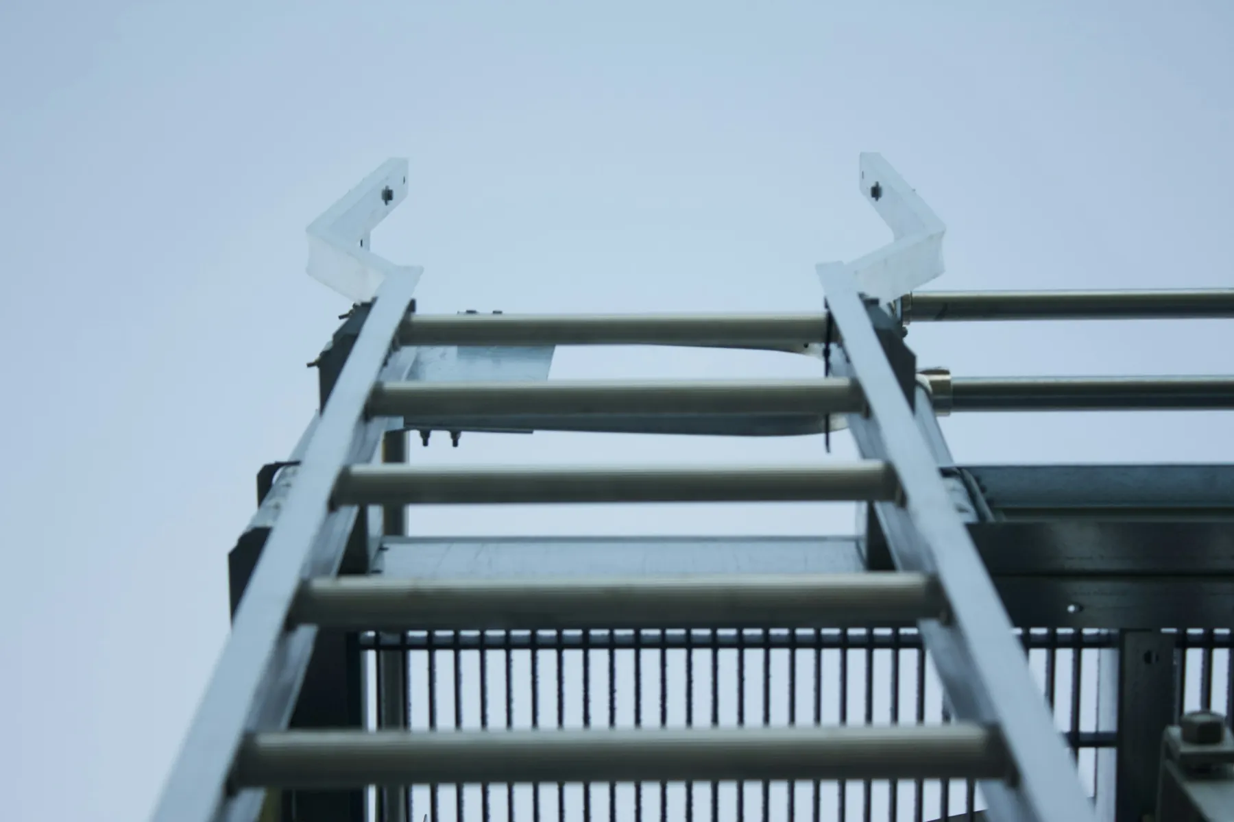 Aluminum ladder against a blue sky